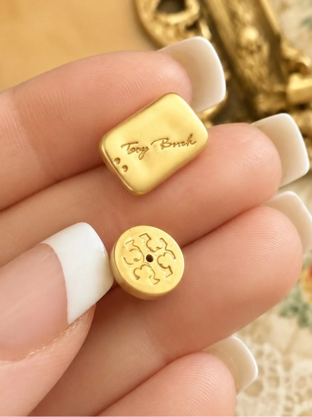 TORY BURCH • Gold Torsade Signature Luggage Tag Nugget Logo Plaque Earrings